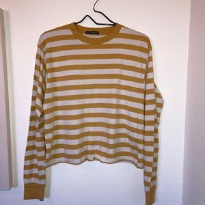 M Brandy Melville yellow and white striped shirt.